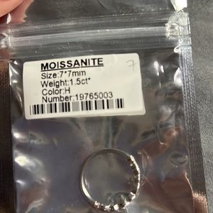 Fits more like a 7.5 moissanite ring never wore